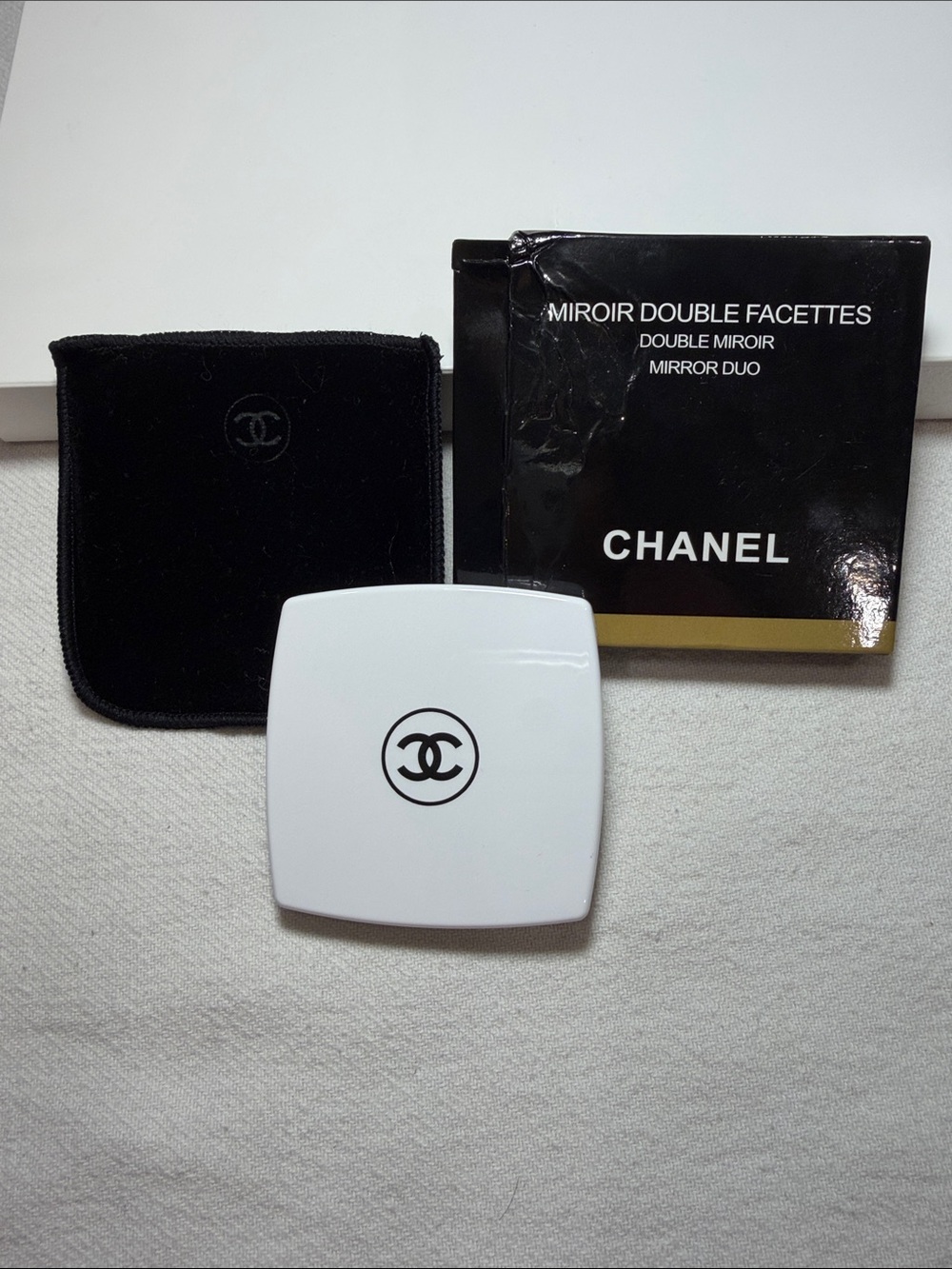 CHANEL White Compact Mirror with Black CC Logo